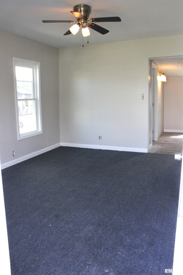 420 S Western Ave, Abingdon, IL 61410 - empty room featuring a ceiling fan, baseboards, and carpet flooring