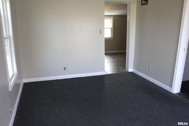 420 S Western Ave, Abingdon, IL 61410 - kitchen with white electric range oven, dark wood finished floors, white cabinets, light countertops, and baseboards
