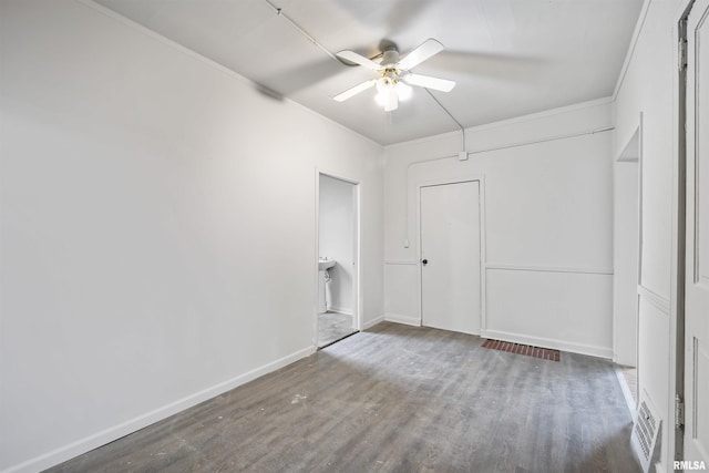 2330 S Airport Rd, Bartonville, IL 61607 - empty room featuring baseboards, crown molding, visible vents, ceiling fan, and wood finished floors