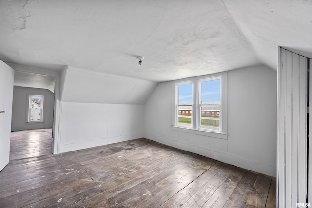 2330 S Airport Rd, Bartonville, IL 61607 - bonus room with plenty of natural light, vaulted ceiling, and hardwood / wood-style floors