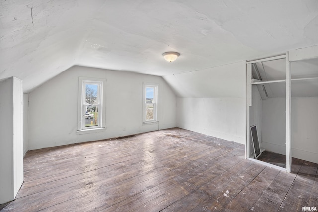 2330 S Airport Rd, Bartonville, IL 61607 - additional living space with lofted ceiling and hardwood / wood-style flooring