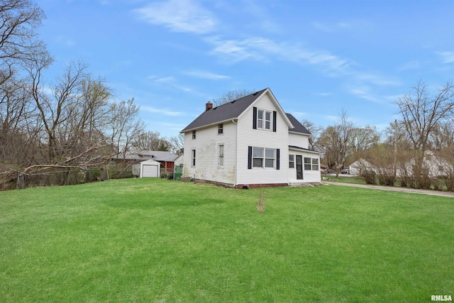 2330 S Airport Rd, Bartonville, IL 61607 - view of side of home with a yard, an outdoor structure, and a chimney