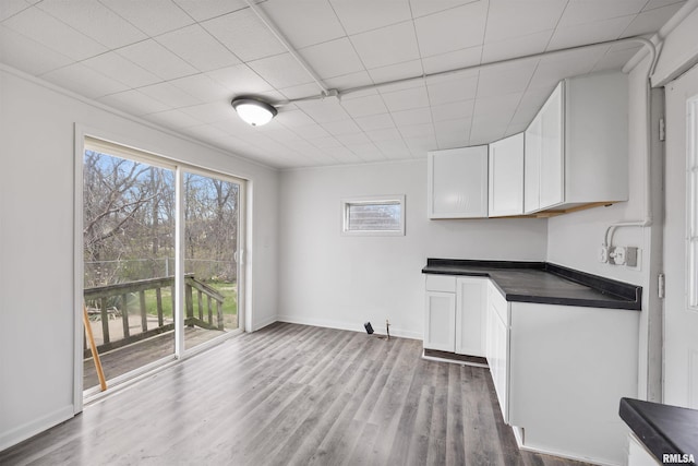 2330 S Airport Rd, Bartonville, IL 61607 - interior space featuring a paneled ceiling, baseboards, and wood finished floors