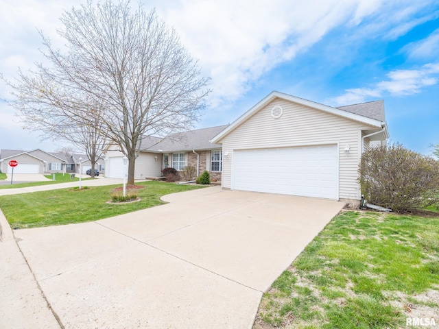 view of front of home featuring concrete driveway and a front yard