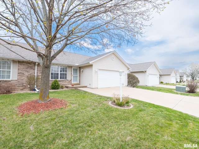 single story home featuring a garage, a front yard, brick siding, and concrete driveway