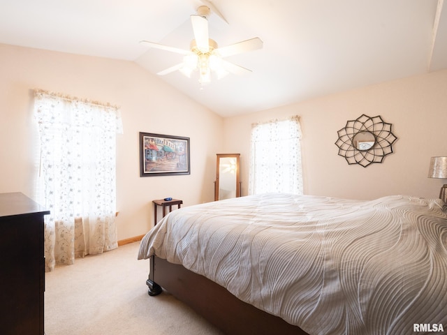bedroom featuring carpet floors, ceiling fan, and lofted ceiling
