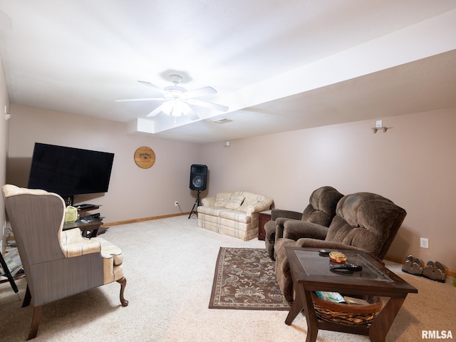 living area featuring ceiling fan, carpet flooring, baseboards, and visible vents
