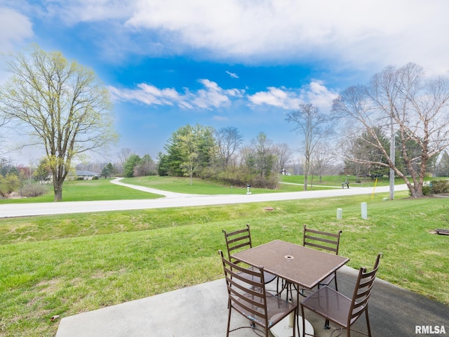 view of patio featuring outdoor dining space
