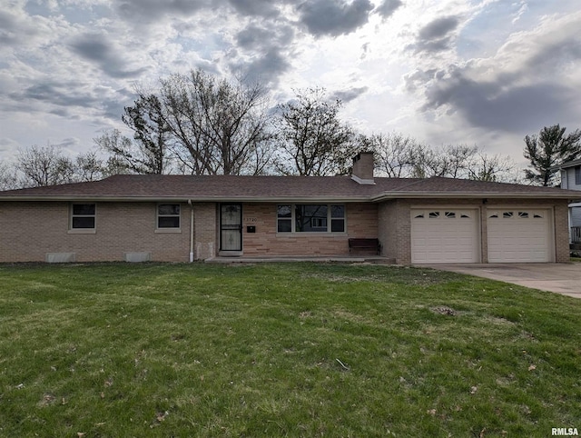3720 Saint Michael Ave, Peoria, IL 61615 - ranch-style home featuring a garage, driveway, and brick siding