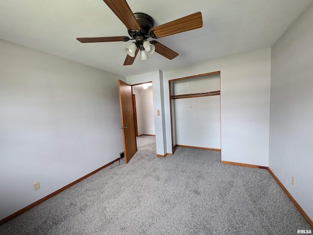3720 Saint Michael Ave, Peoria, IL 61615 - unfurnished bedroom featuring ceiling fan, a closet, light colored carpet, and baseboards