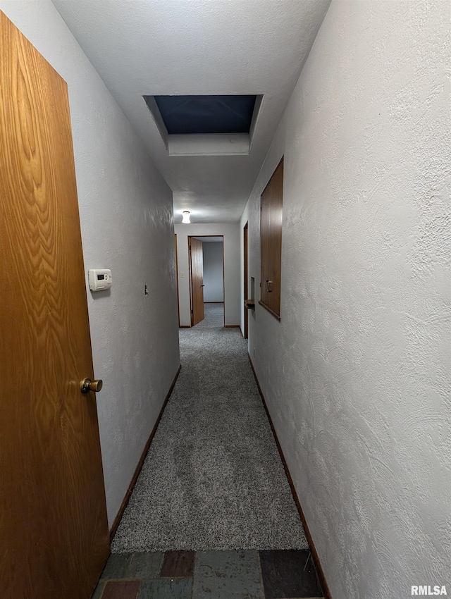 3720 Saint Michael Ave, Peoria, IL 61615 - corridor featuring carpet floors and attic access