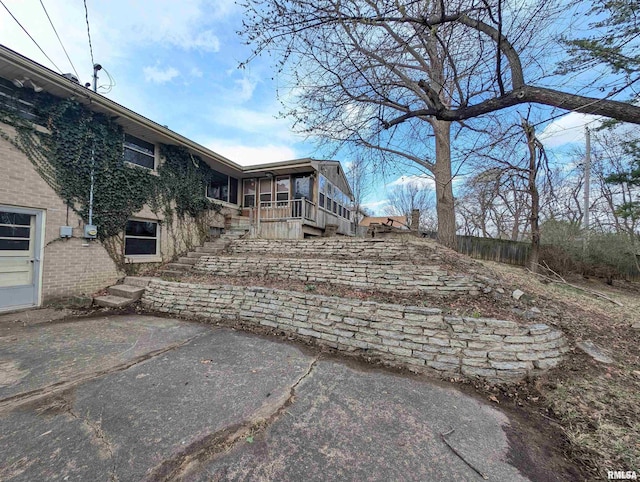 3720 Saint Michael Ave, Peoria, IL 61615 - exterior space featuring a patio area and stairs