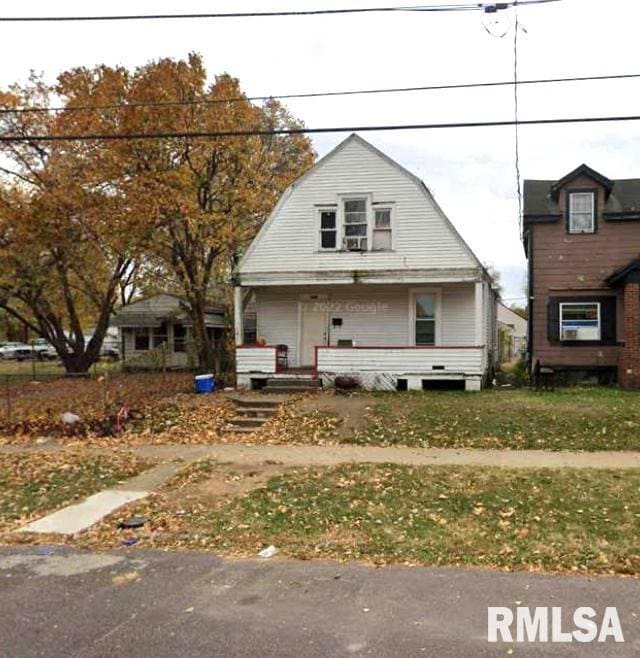 2126 W Proctor St, Peoria, IL 61605 - dutch colonial featuring a gambrel roof and covered porch