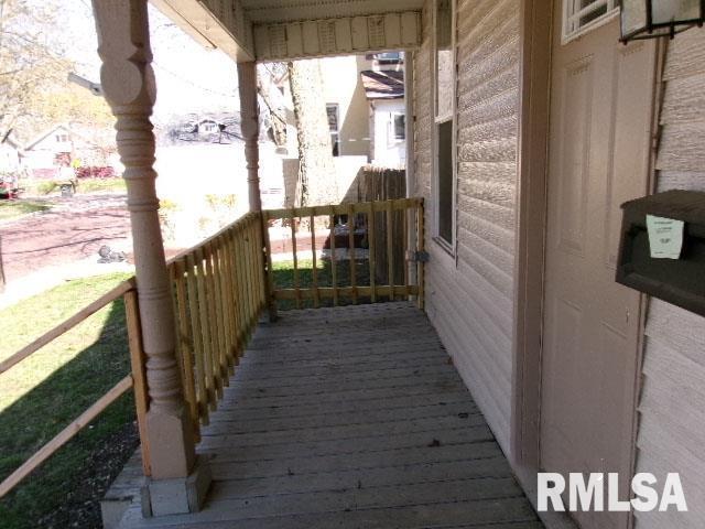 wooden terrace with covered porch