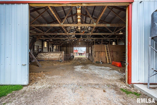 miscellaneous room with lofted ceiling