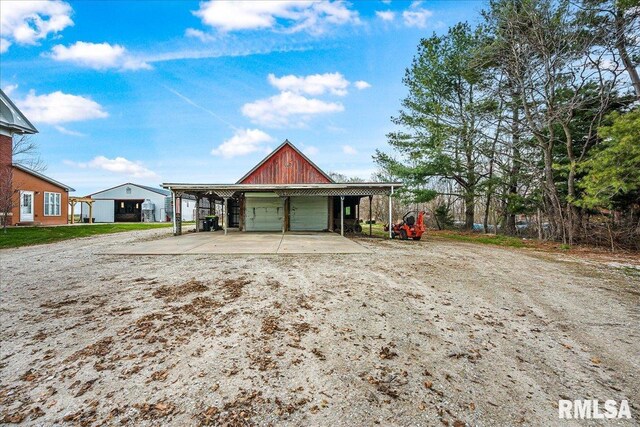 garage featuring driveway