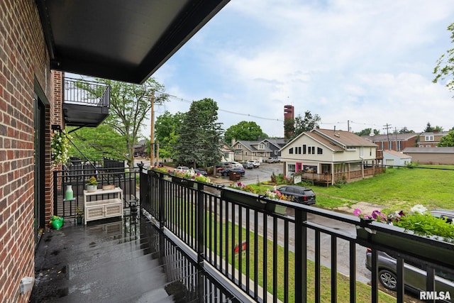 1310 E Samuel Ave, Peoria Heights, IL 61616 - balcony featuring a residential view