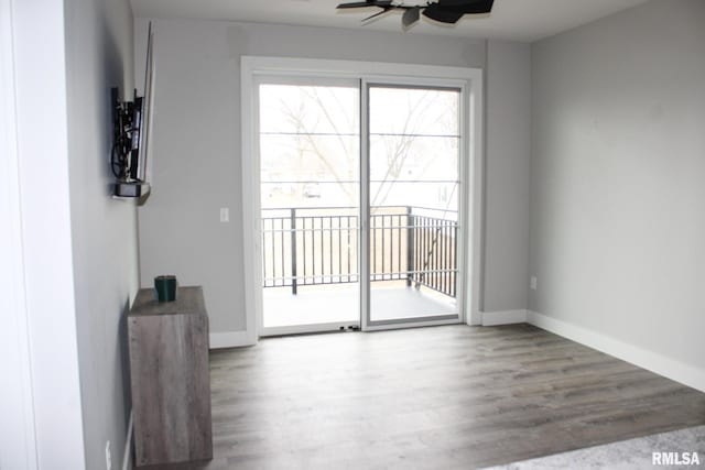 1310 E Samuel Ave, Peoria Heights, IL 61616 - interior space featuring baseboards, a ceiling fan, and wood finished floors