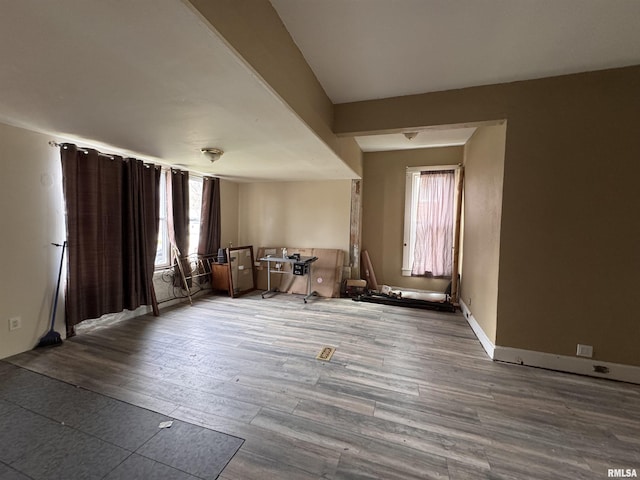 unfurnished room featuring wood finished floors