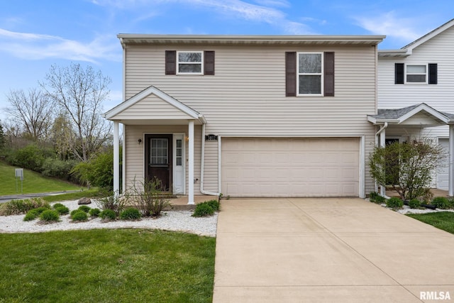 3802 W Richwoods Blvd Unit 1, Peoria, IL 61615 - view of front of property featuring driveway, a front yard, and a garage