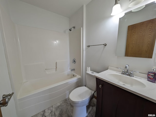 bathroom featuring shower / washtub combination, vanity, and toilet