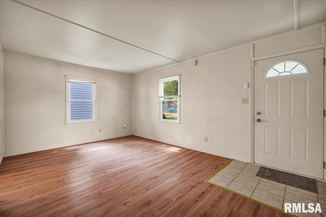 301 E Ellington Dr, Peoria, IL 61603 - foyer with wood finished floors and crown molding