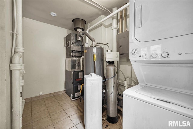 301 E Ellington Dr, Peoria, IL 61603 - laundry area with stacked washing machine and dryer, electric panel, electric water heater, tile patterned flooring, and heating unit