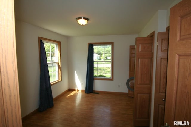 406 N Minier Ave, Minier, IL 61759 - unfurnished room with baseboards and wood finished floors