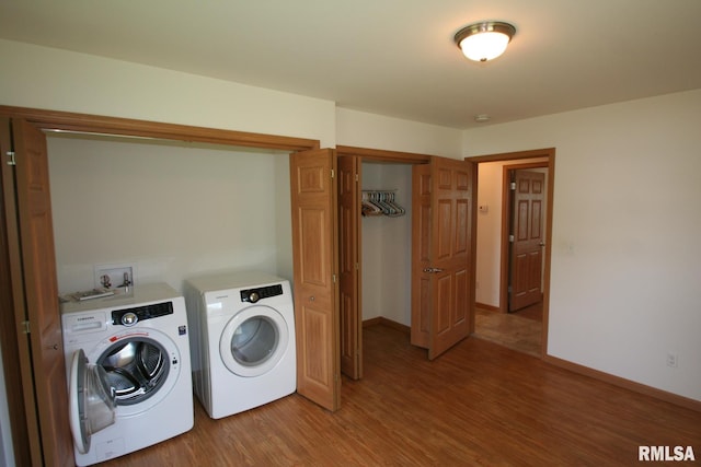 406 N Minier Ave, Minier, IL 61759 - washroom with baseboards, independent washer and dryer, laundry area, and light wood-type flooring