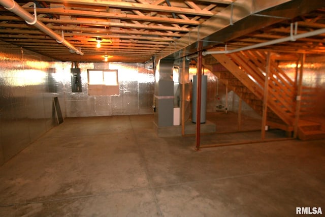 406 N Minier Ave, Minier, IL 61759 - basement with heating unit, electric panel, and water heater