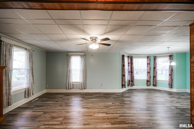 238 E Prospect St, Galesburg, IL 61401 - empty room with wood finished floors, baseboards, and a healthy amount of sunlight