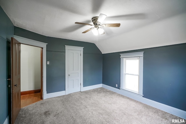 238 E Prospect St, Galesburg, IL 61401 - additional living space featuring vaulted ceiling, carpet floors, a ceiling fan, and baseboards
