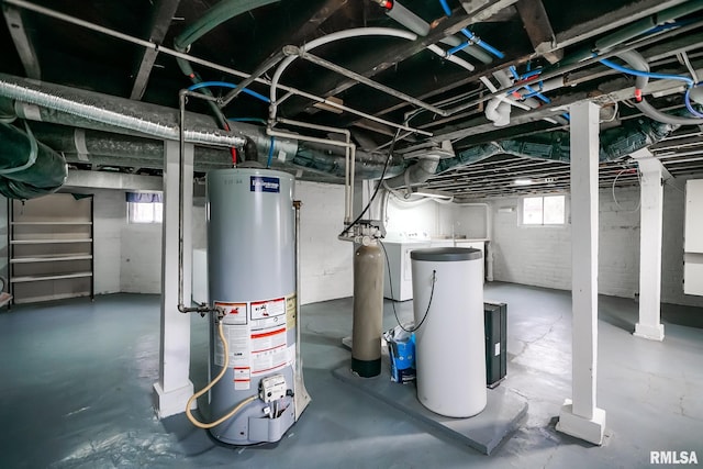 238 E Prospect St, Galesburg, IL 61401 - below grade area featuring water heater and separate washer and dryer