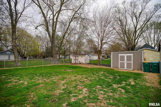 238 E Prospect St, Galesburg, IL 61401 - view of yard with a fenced backyard, an outdoor structure, and a shed