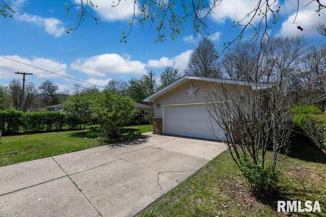 garage with concrete driveway