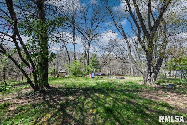 view of yard featuring fence