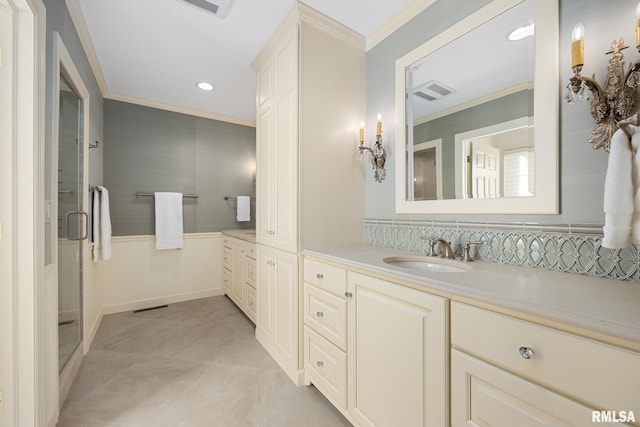 bathroom featuring crown molding, vanity, visible vents, recessed lighting, and a stall shower