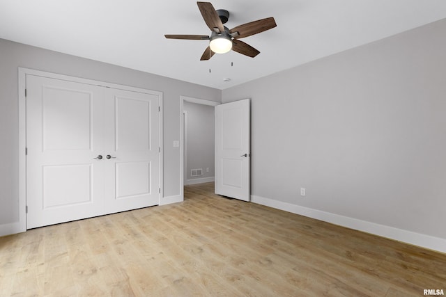 1109 Lawson St, Washington, IL 61571 - unfurnished bedroom with light wood-style floors, a closet, and ceiling fan