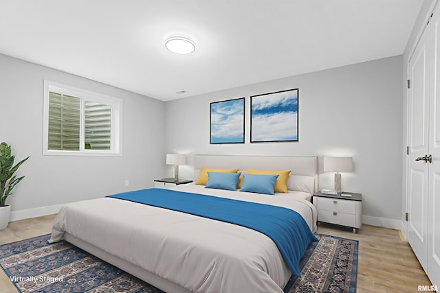 1109 Lawson St, Washington, IL 61571 - bedroom with baseboards and light wood-style flooring