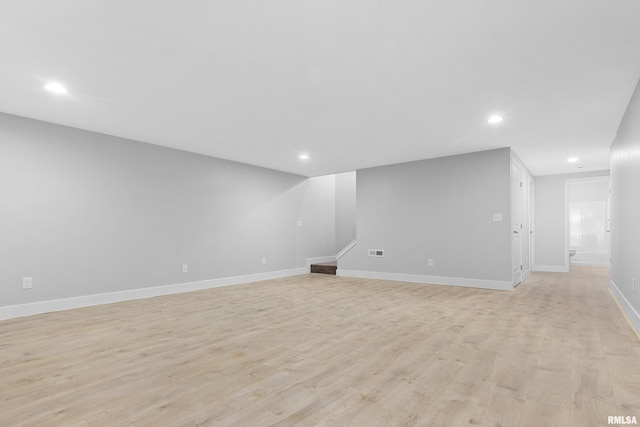 1109 Lawson St, Washington, IL 61571 - unfurnished living room featuring recessed lighting and light wood-style floors