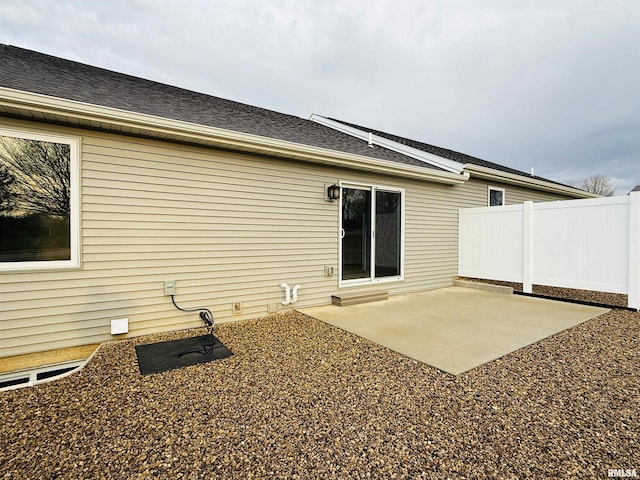 1109 Lawson St, Washington, IL 61571 - rear view of house with a patio area and roof with shingles