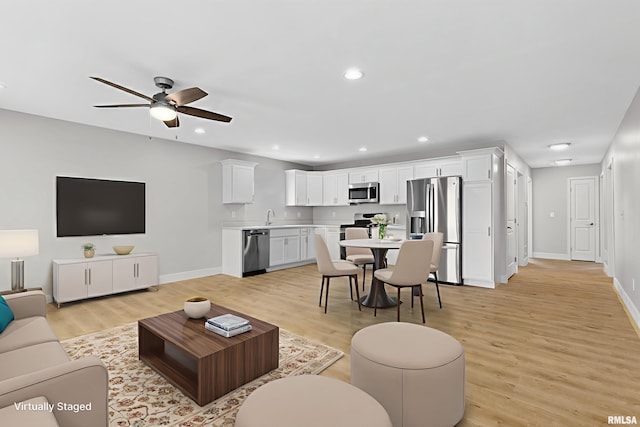 1109 Lawson St, Washington, IL 61571 - living area with ceiling fan, light wood finished floors, and recessed lighting