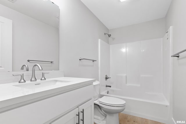 1109 Lawson St, Washington, IL 61571 - full bath featuring vanity, wood finished floors, and shower / washtub combination