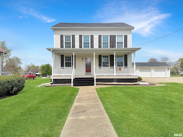 370 W Carter St, Fairview, IL 61432 - colonial home with a detached garage, a porch, and a front yard