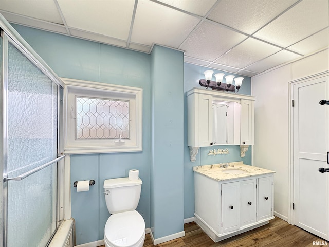 370 W Carter St, Fairview, IL 61432 - bathroom with a paneled ceiling, toilet, vanity, and wood finished floors
