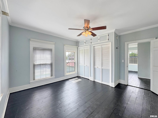 370 W Carter St, Fairview, IL 61432 - unfurnished bedroom with ornamental molding, baseboards, and dark wood-style flooring