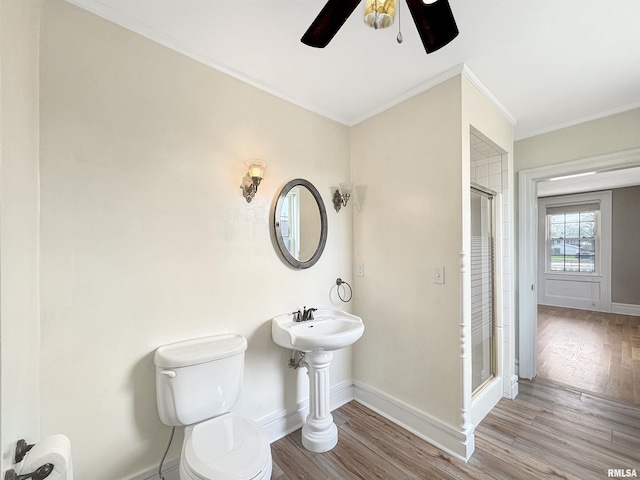370 W Carter St, Fairview, IL 61432 - full bathroom featuring a shower stall, wood finished floors, a ceiling fan, and baseboards