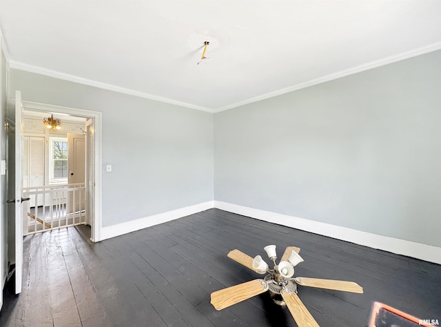 370 W Carter St, Fairview, IL 61432 - empty room featuring crown molding, baseboards, a notable chandelier, and dark wood-style floors