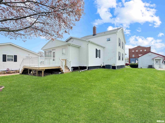 370 W Carter St, Fairview, IL 61432 - back of property with a wooden deck, a chimney, a yard, and cooling unit