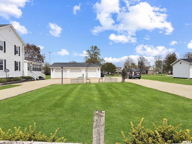 370 W Carter St, Fairview, IL 61432 - view of front of home with gravel driveway and a front yard